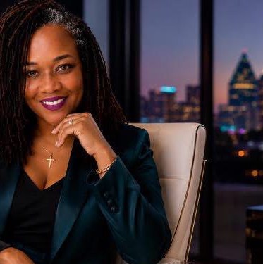 LaJoy Grant, executive portrait with Dallas skyline